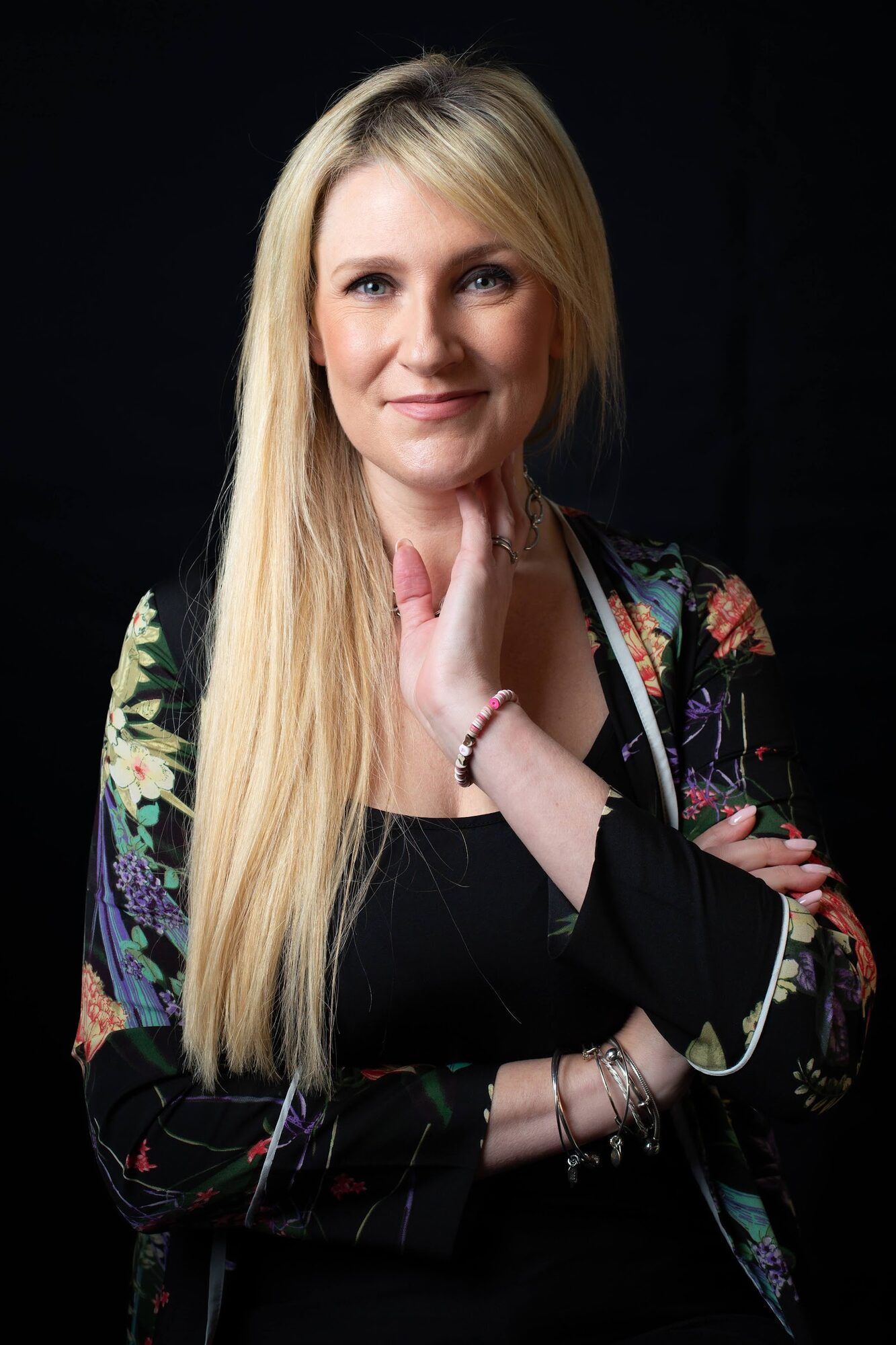 Woman with long blonde hair in a patterned kimono